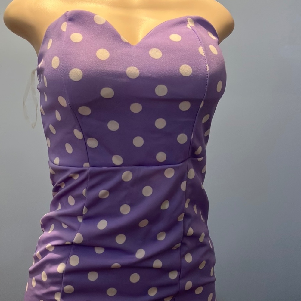 This is a vintage lilac polka dot dress
